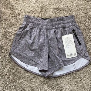 SOLD. LULU GREY Tracker Short 4” size 6